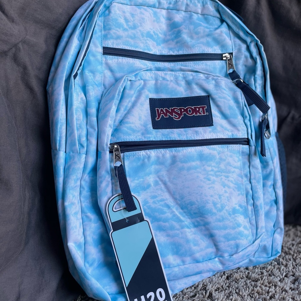 Jansport backpack, blue and clouds.